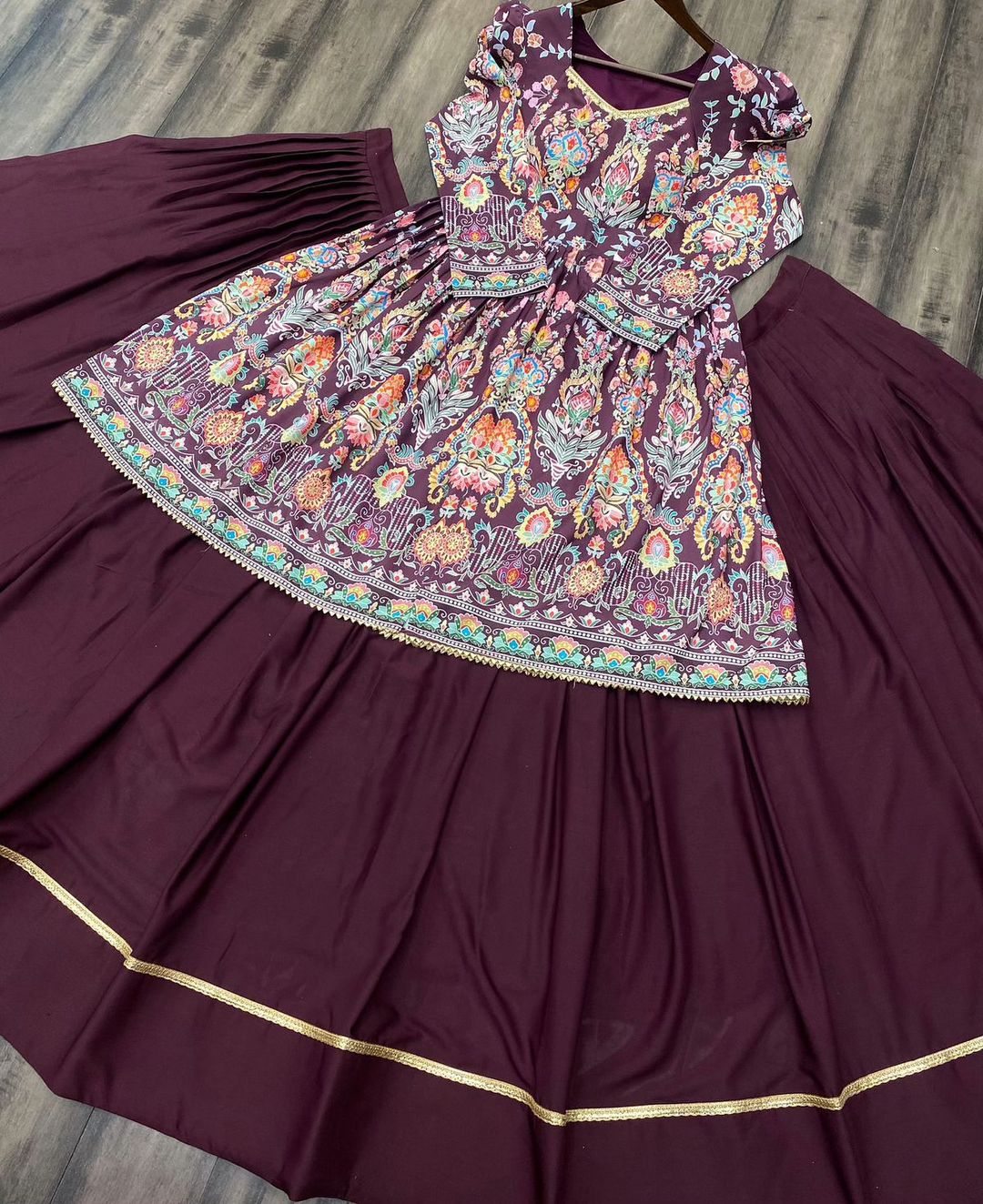 NAVRATRI BEUTIQUE STYLES RAYON PRINTED WINE COLOUR LEHENGA